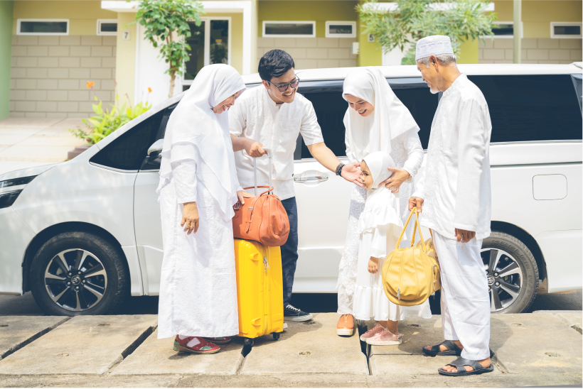 young-muslim-family-standing-by-car-visiting-parents 1